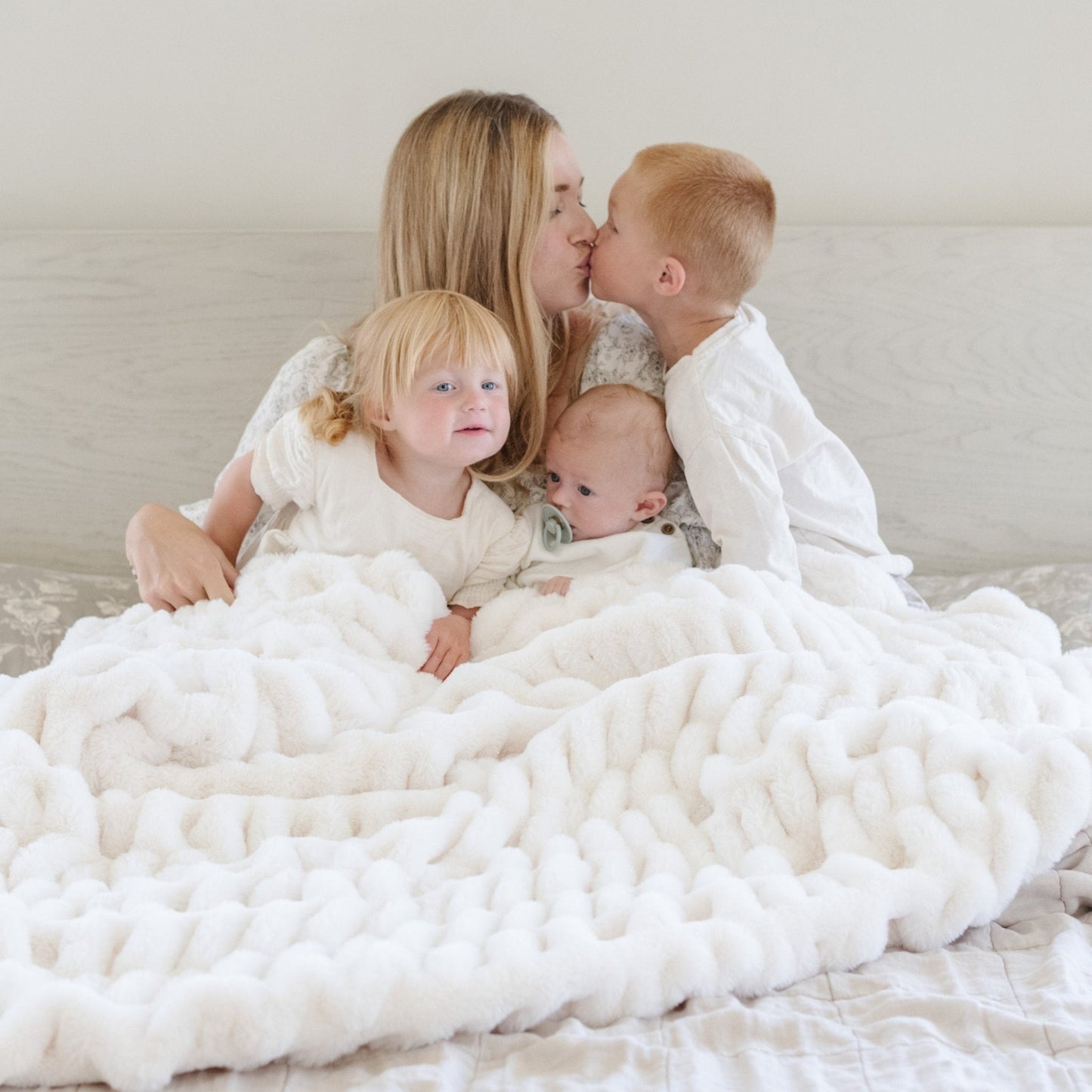 DOUBLE RUCHED FAUX FUR THROW BLANKETS - Best blankets and throws: Saranoni Ruched Minky in a relaxing bedroom