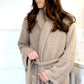 Woman tying her super soft and stretchy Taupe COZY BAMBONI ROBES - Saranoni