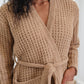 Detailed image of a cozy, waffle knit robe.
