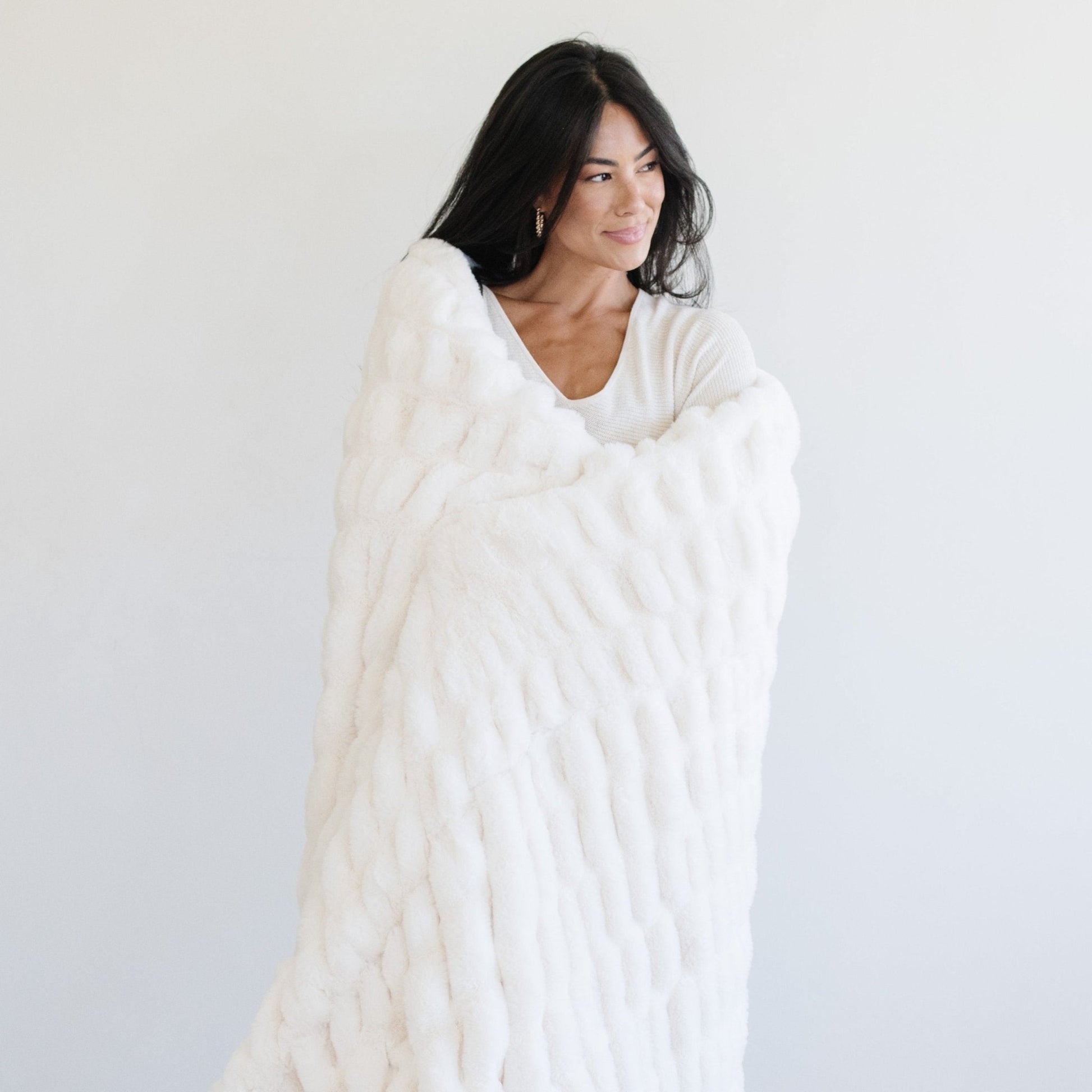 DOUBLE RUCHED FAUX FUR XL THROW BLANKETS - Luxury blanket with textured ruched design, perfect for snuggling.